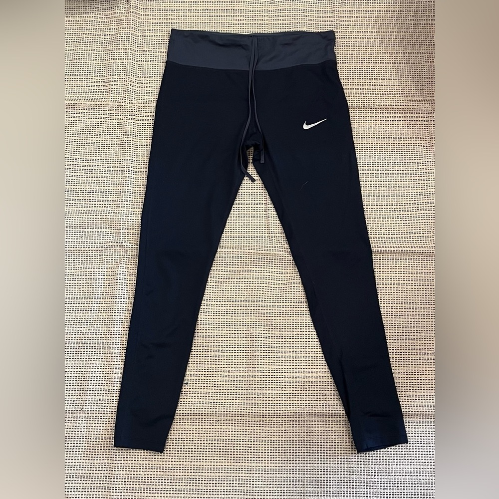 Nike leggings blue with ties. Nike running leggings